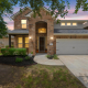 Leander real estate photography twilight brick home exterior